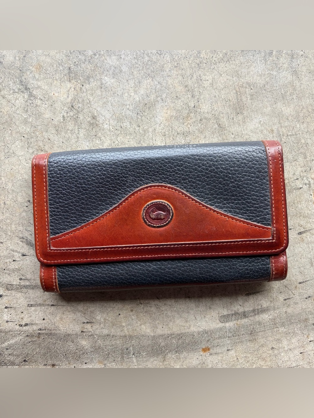 Dooney & Bourke Black with Brown Trim Leather Wallet